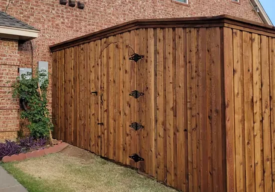 Beautiful high-end, stained cedar 10 foot fence after completion