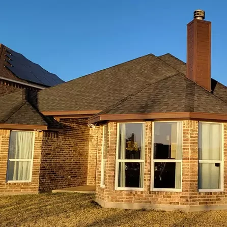 After photo of new roof and re-painted trim