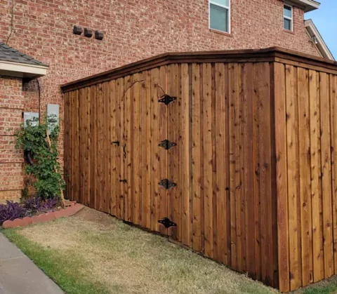Beautiful high-end, stained cedar 10 foot fence after completion