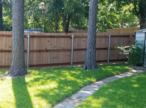New fence after installation in large yard