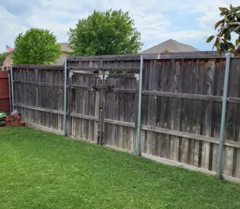 Side panels of old fence and gate before update