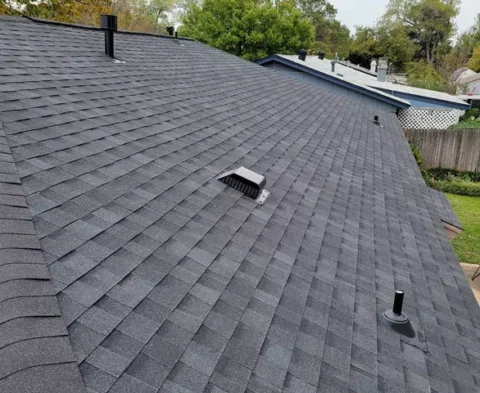 new roof with roof ridge capping and repainted vents