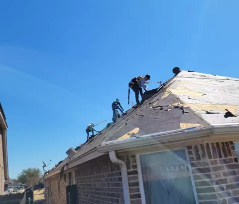Home getting a new roof and shingles being removed also before trim repainted