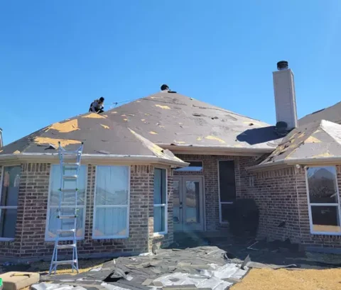 Home getting a new roof and shingles being removed also before trim repainted