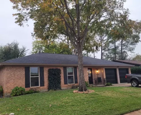 repainted exterior trim, garage doors, shutters, and new roof