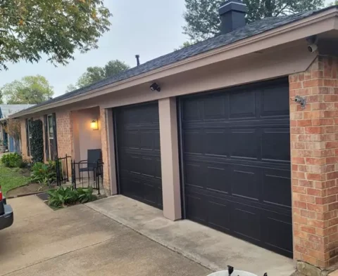 repainted exterior trim, garage doors, shutters, and new roof