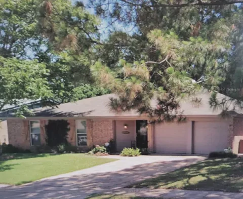Before photo of old roof and trim before painting