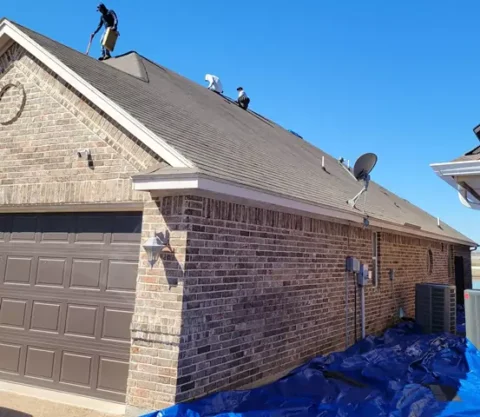 Home getting a new roof and shingles being removed also before trim repainted